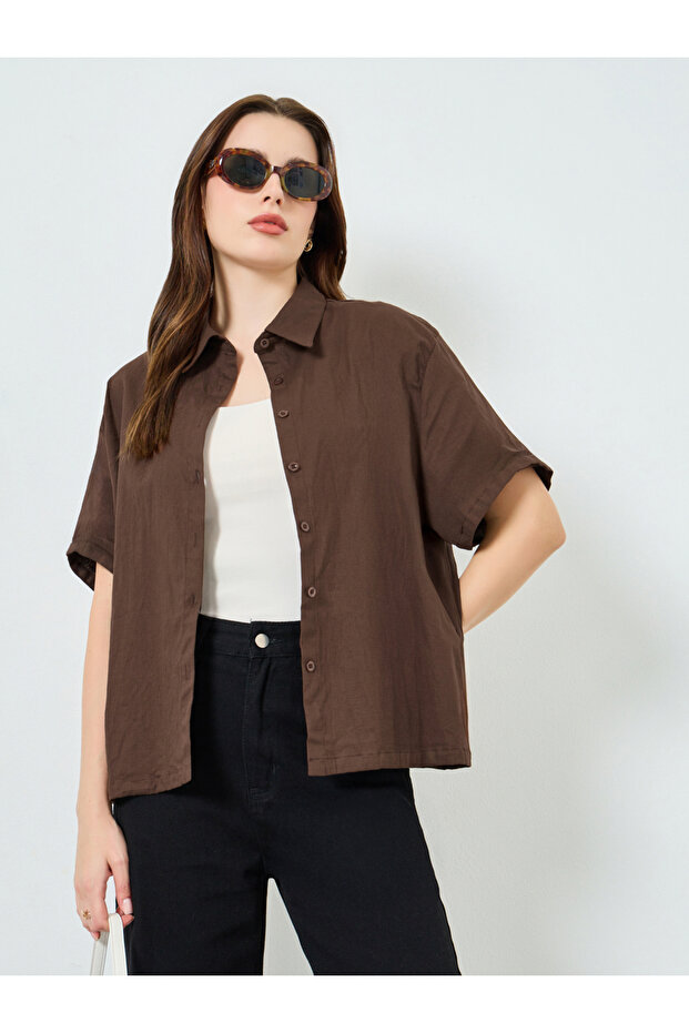 قميص نسائي سادة فضفاض بأكمام قصيرة