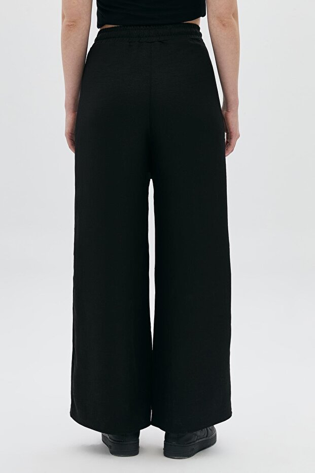 بنطال مزين بالأحجار مع ربطات جزئية - 4