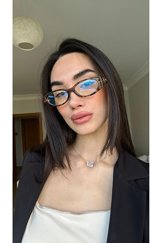 نظارات متغيرة الألوان من الزجاج المقاوم للضوء الأزرق مع إكسسوارات GG بنمط جلد الفهد
