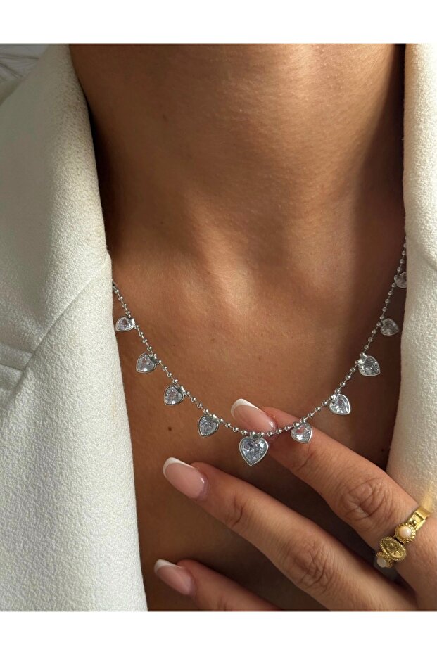 Steel vip silver color ball chain necklace with sequential hearts.
