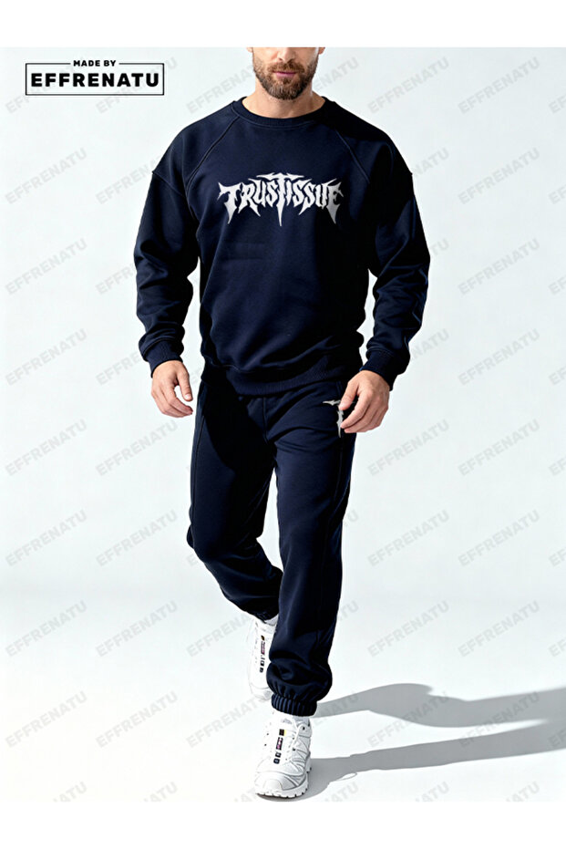 The Hoodless, Navy Blue Tracksuit Is Designed with Original Prints.