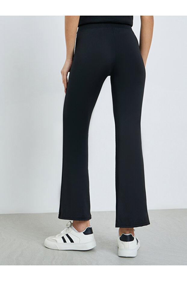 بنطال ضيق أسود واسع الأرجل - 4