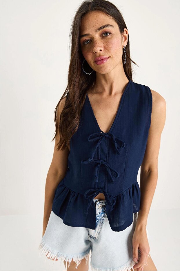 Women's Navy Blue Tie-Front Sleeveless Skirt with Ruffled Muslin Blouse