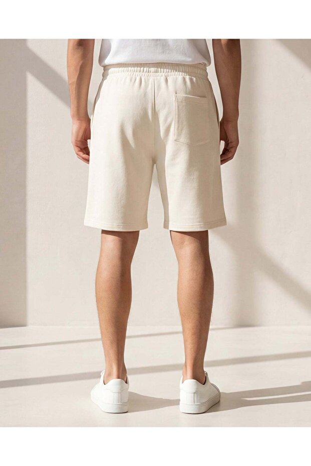 شورت رجالي بلون عاجي قماش إنترلوك - 4