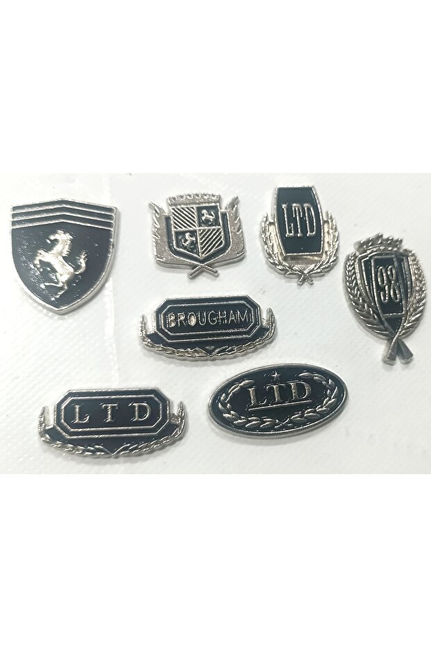 7 Pieces of Black Metal Nuts with Emblem Tape