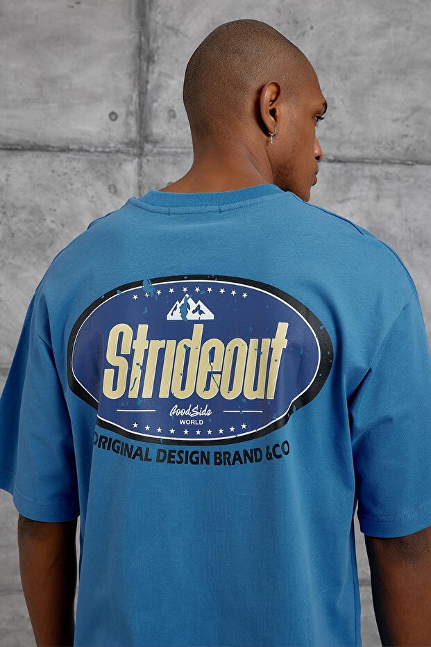 تي شيرت أزرق كبير الحجم مطبوع عليه STRIDEOUT - 3
