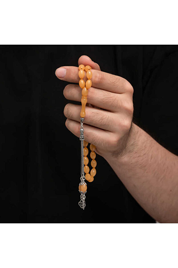 خرز صلاة عنبر مجعد بشرابة فضية