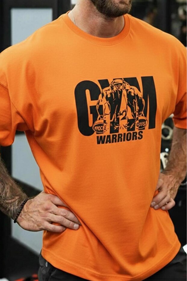 تي شيرت رجالي برتقالي اللون مطبوع عليه Gym Warriors مقاس كبير
