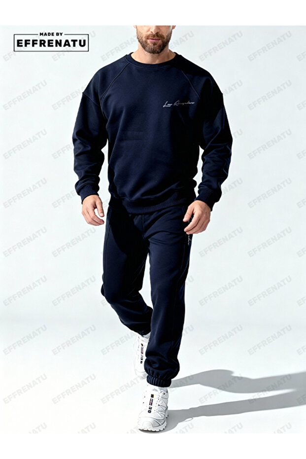 The Hoodless, Navy Blue Tracksuit Is Designed with Original Prints.