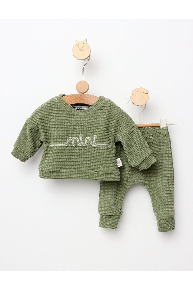 Mini green patterned jumpsuit 80 (9-12 months)