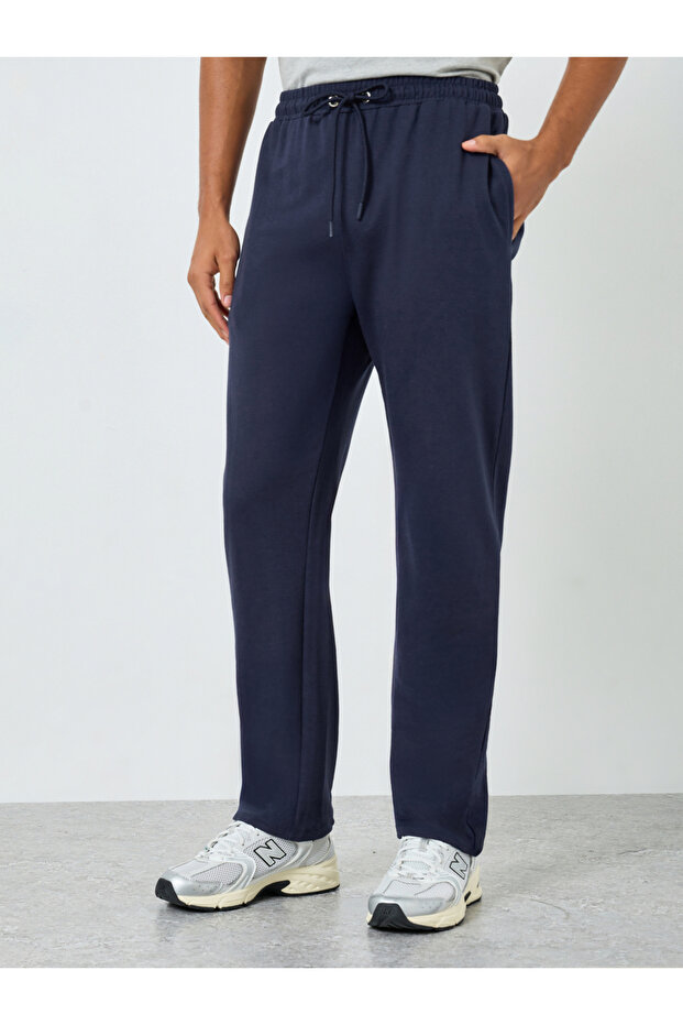 بنطال رياضي رجالي أزرق داكن سادة برباط - 1