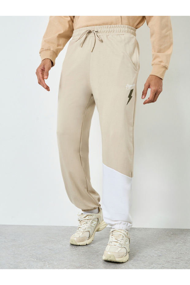 Men Beige Color Block Joggers with Drawstring