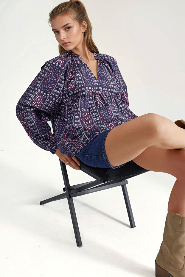 Patterned blouse with puff sleeves - 5