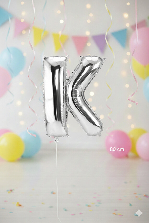 بالون فويل فضي حجم وسط حرف (K).