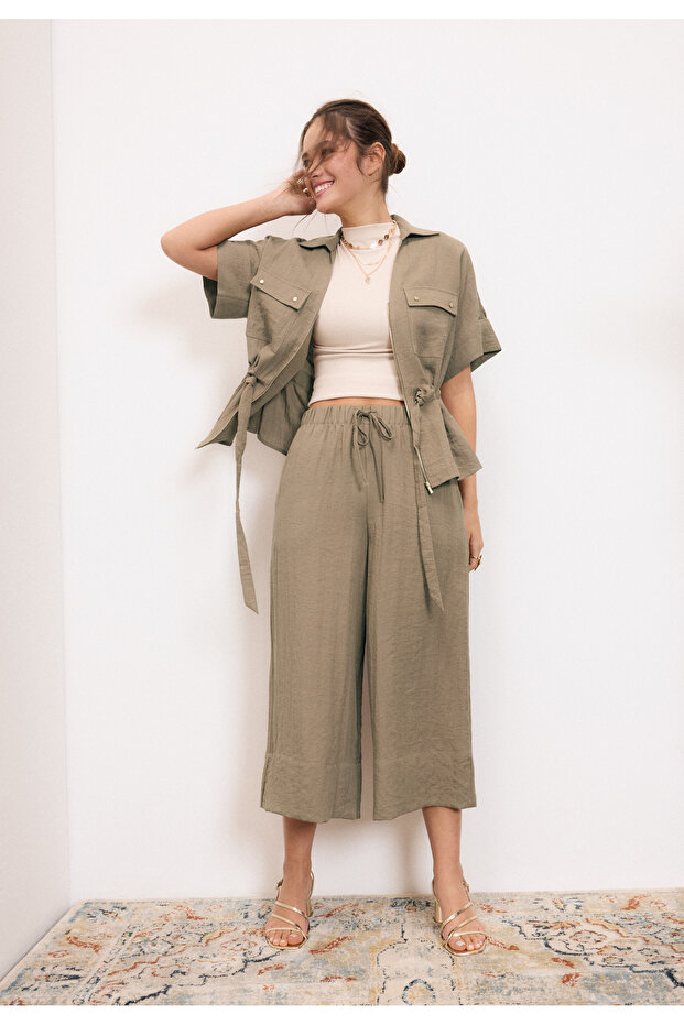 بنطلون واسع مزين بشرابات - 3