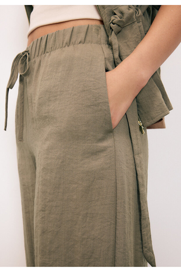 بنطلون واسع مزين بشرابات - 2