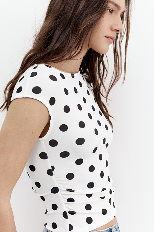 Asimetrik büzgülü top - 6