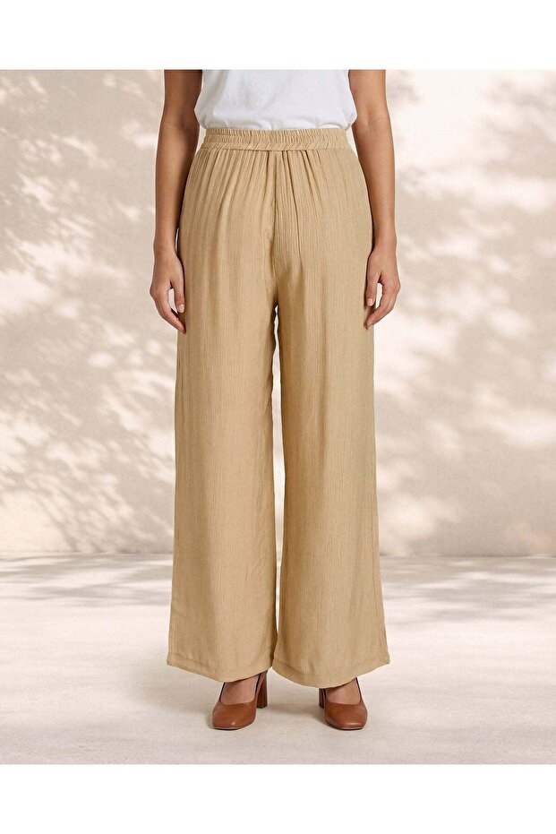 Women Beige Wide Leg Trousers