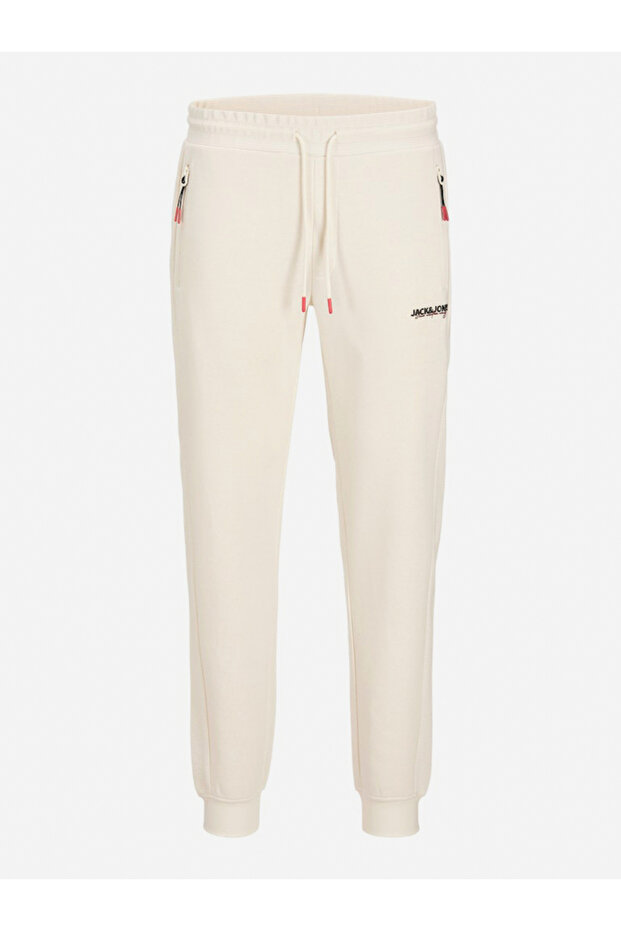 بنطال ذو ملمس بارز أبيض مائل للبيج ذو أطراف مطوية ولوحة منقوشة - 1