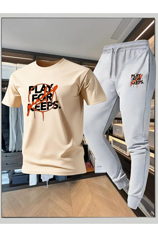 طقم بدلة رياضية PLAY مطبوع كبير الحجم