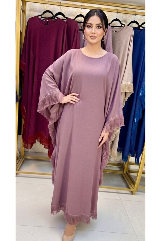 A dress with an accessory on the sleeves