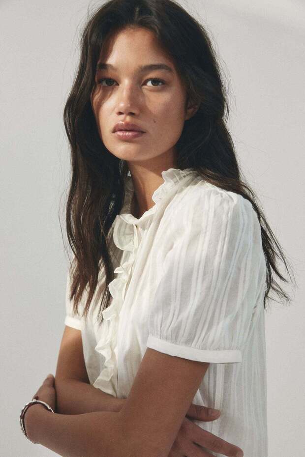 Frill-trimmed cotton blouse
