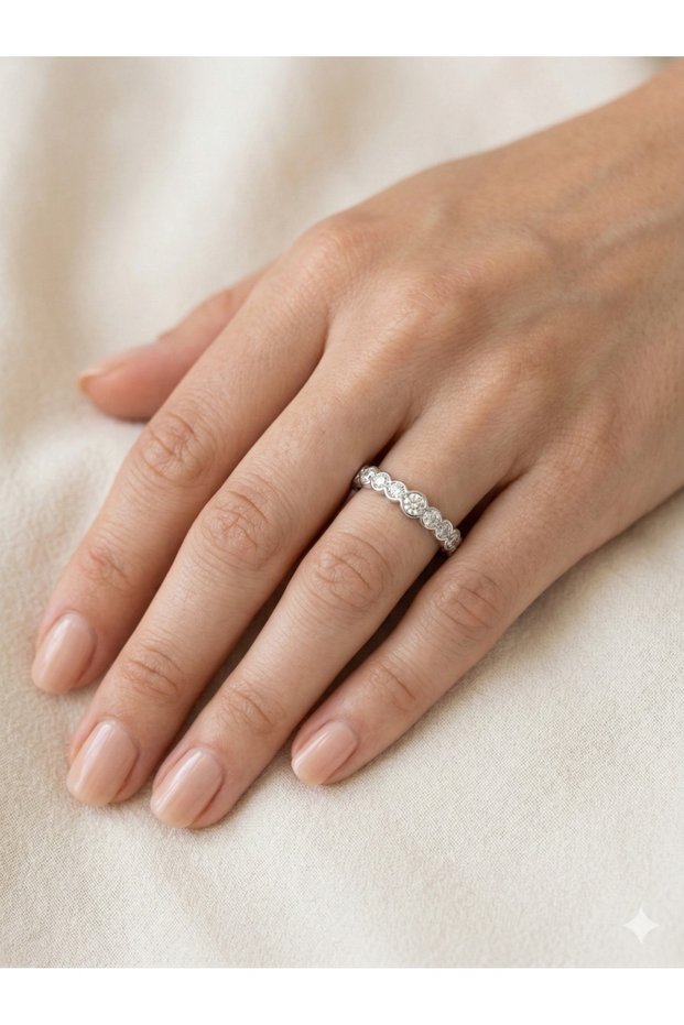 3S a Meeting of Elegance and Steel: Bezel-Set Row of Sparkling Rings