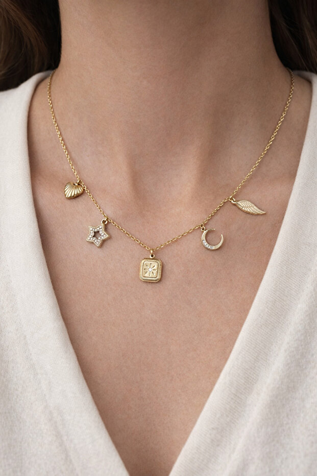 Steel Charm Necklace – Featuring Star, Moon, Wing, and Seashell Figures