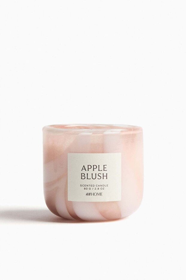 Scented candle in glass holder