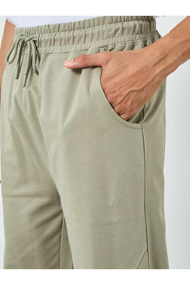 بنطال رياضي رجالي بيج سادة برباط - 3