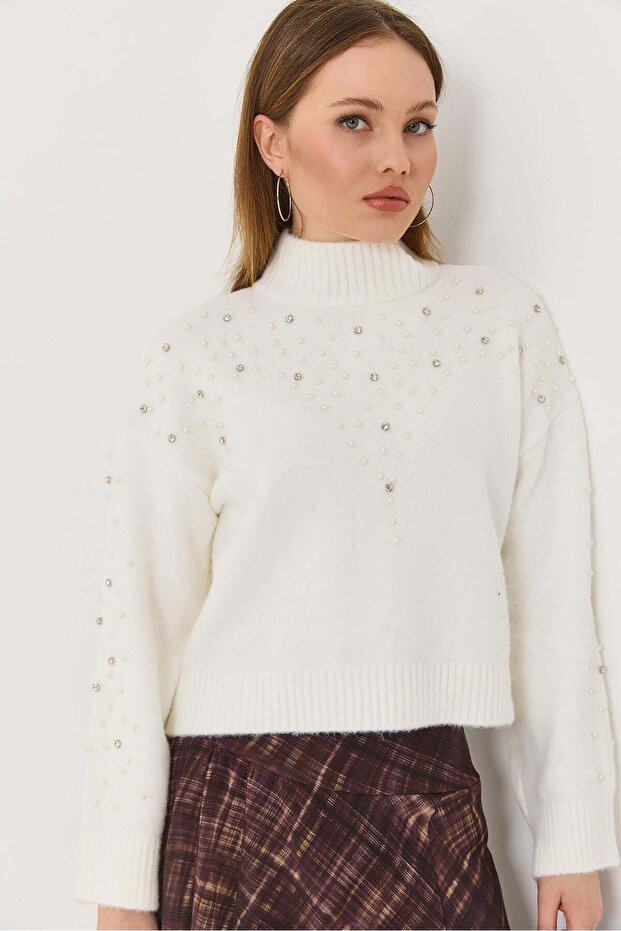 Women's turtleneck knit sweater with stone and pearl embellishments - white
