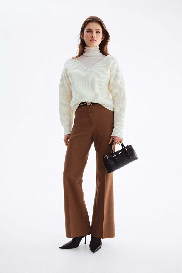 Belted bootcut trousers