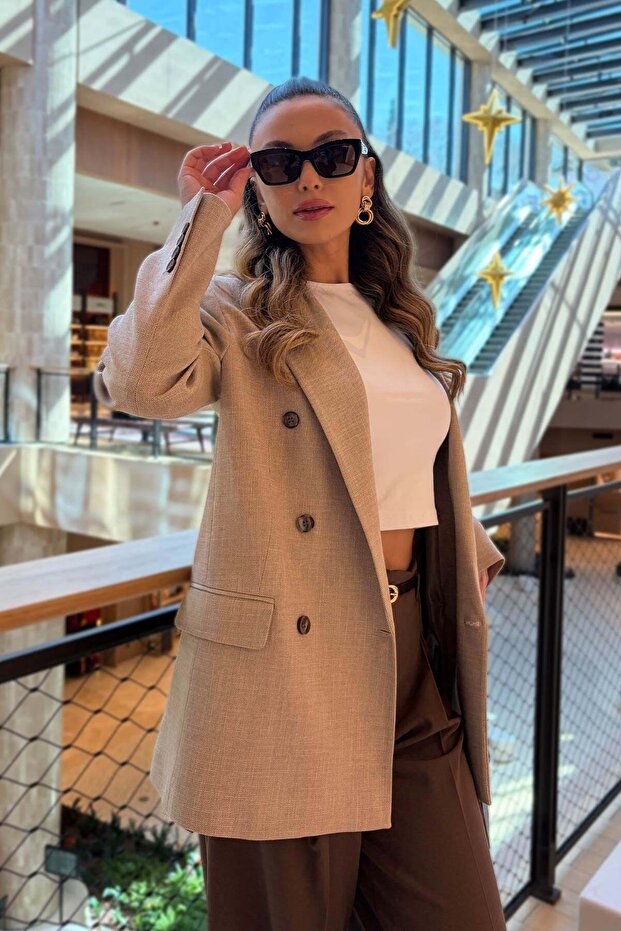 سترة نسائية من سوس بجيوب بنقش مربعات بليزر
