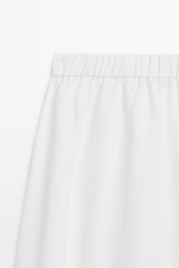 Elastik detaylı dökümlü midi etek - 6