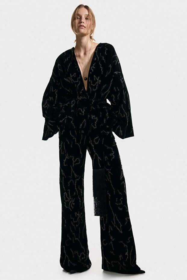 Embroidered velvet trousers