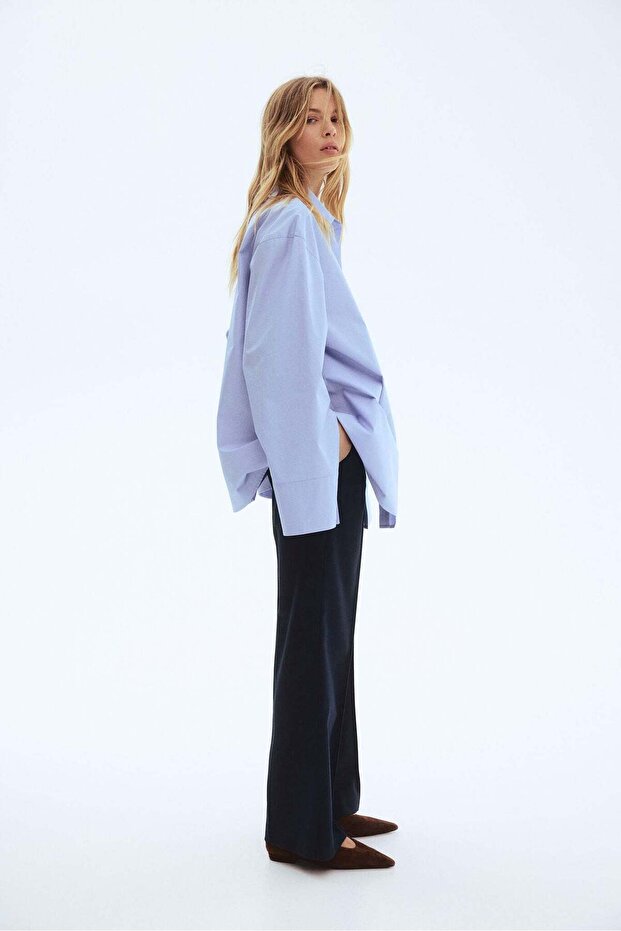 Flared belted trousers - 1