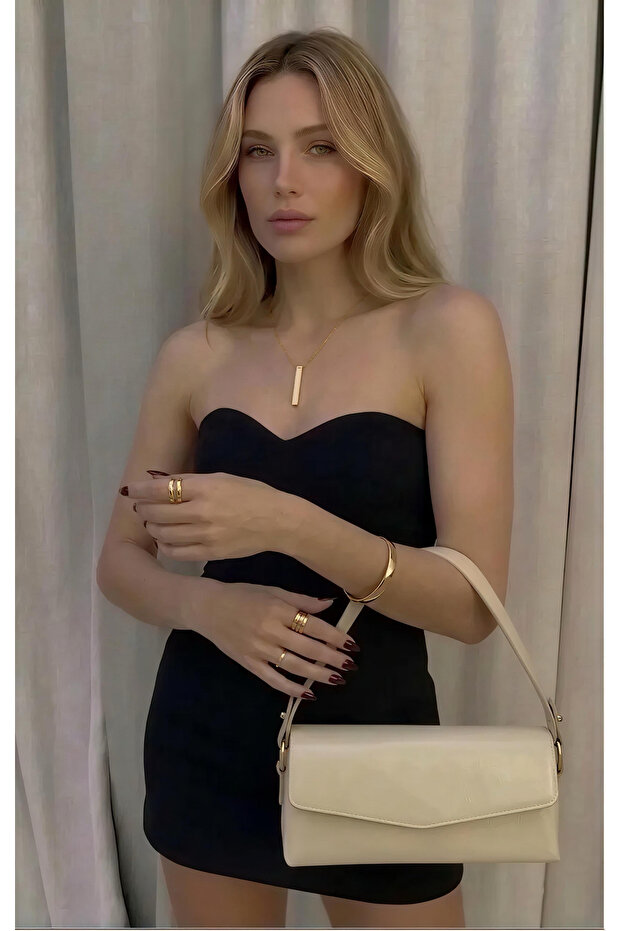 حقيبة كتف وحقيبة يد نسائية كريمية اللون
