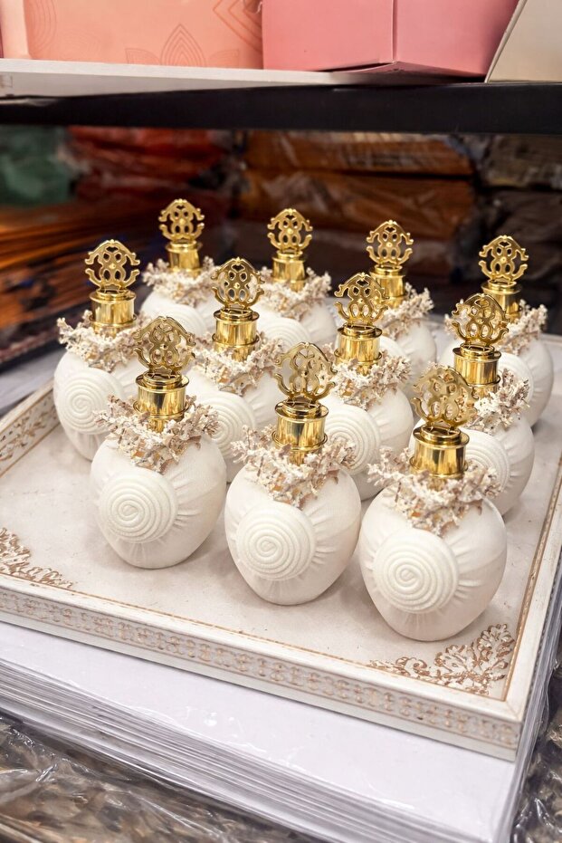 عطر ميني ذهبي منسق توزيعات مناسبات ( 12حبة )