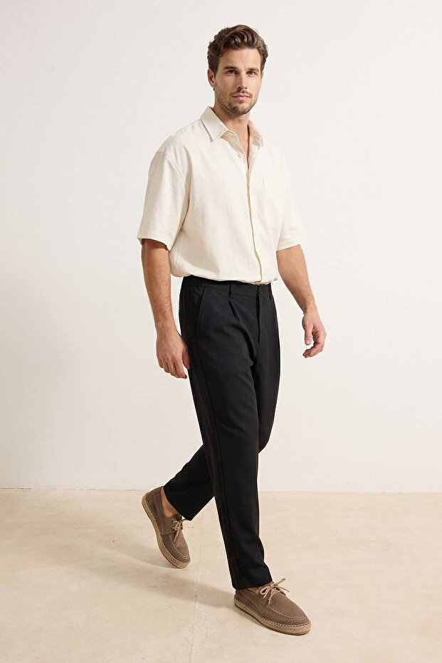 Siyah Bol Kalıp/Baggy Fit Boru Paça Ütü İzli Erkek Dokuma Pantolon TMNSS26PL00021