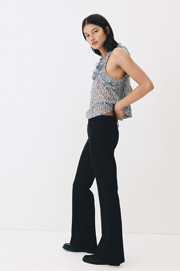 Flared tailored trousers - 1