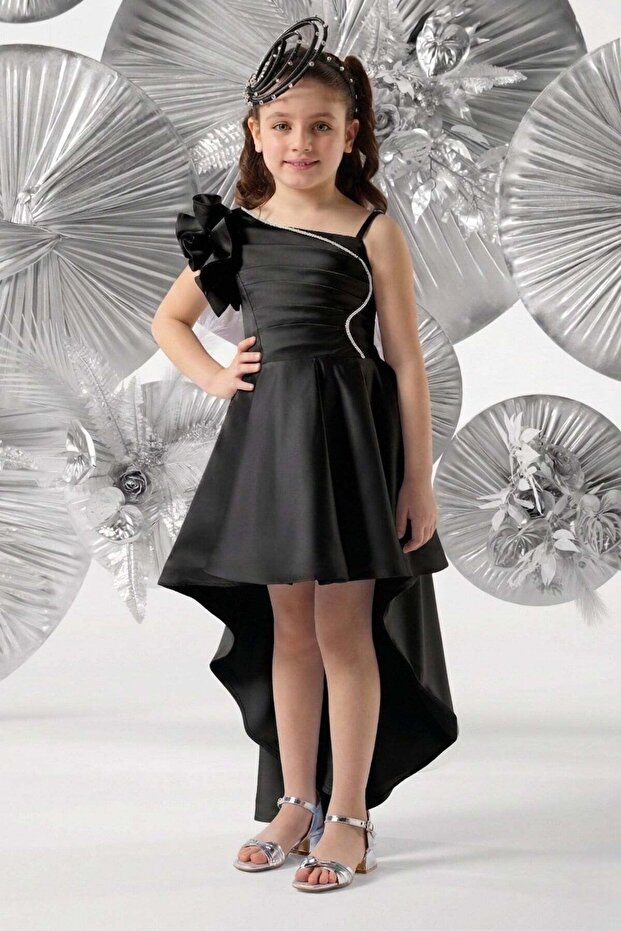 Mojo girls' 5-10 year old black evening dress with shoulder ruffles, short front and long back