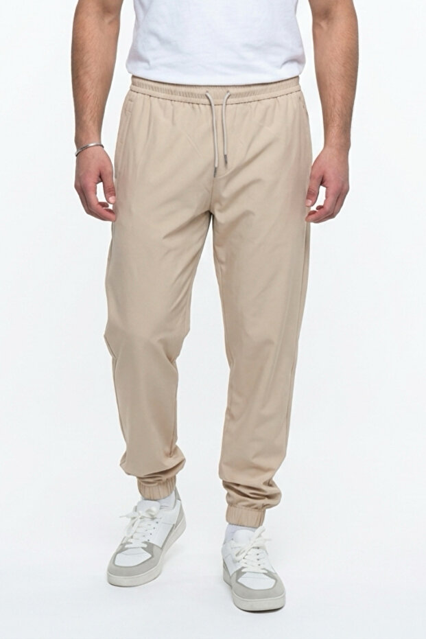 Men's Beige Summer Ultra Thin Parachute Fabric Relaxed Fit Sweatpants with Zipper Pockets and Elastic Cuffs