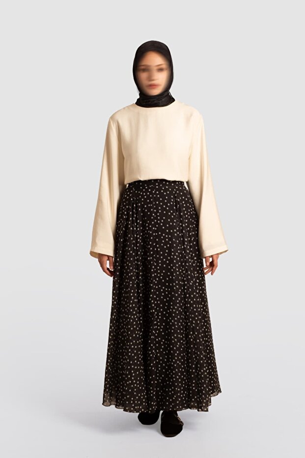 تنورة شيفون منقطة باللون الأسود