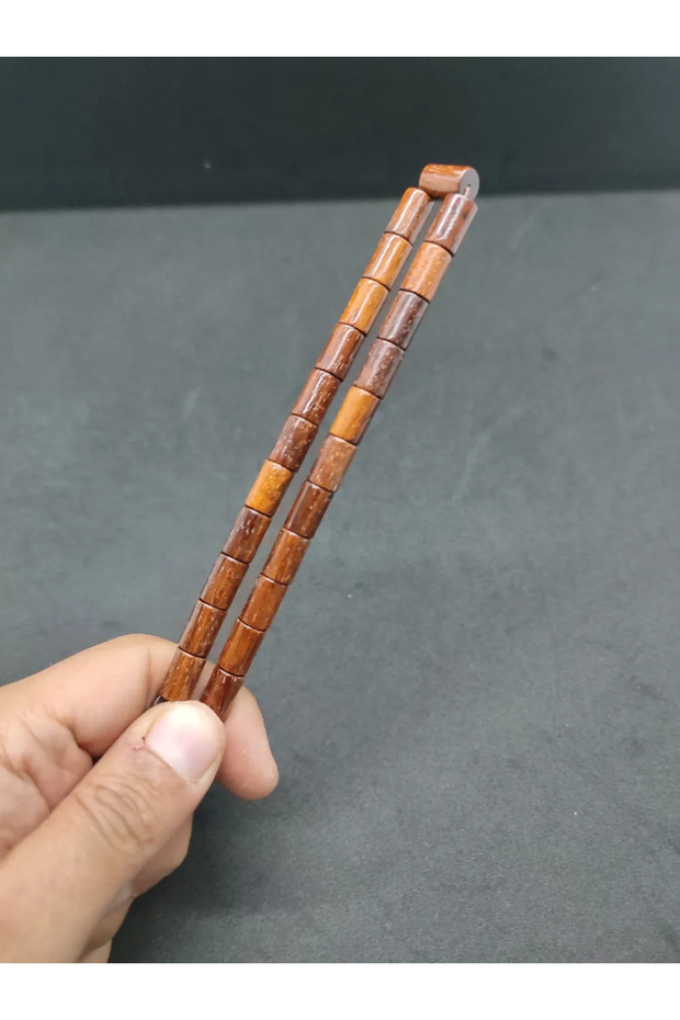 Mehmet Erbabacan's Masterpiece: Hand-Cut Snake Wood with a Signature Design That Resembles a Sword