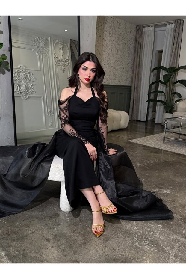 فستان سهرة اسود بأكمام