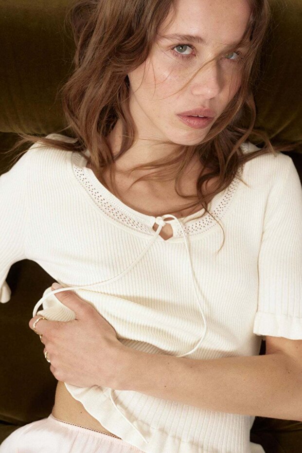 Frill-trimmed rib-knit top