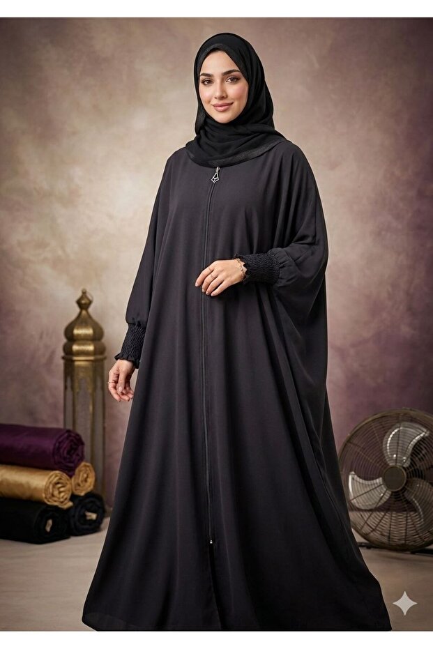 شال بأكمام على شكل خفاش هو هدية