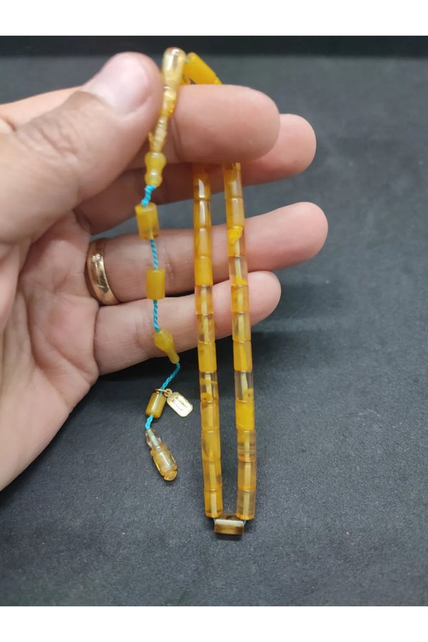 Mehmet Mercan Masterpiece, Ankle-Length Arrow-Like Cutting and Crimping Amber