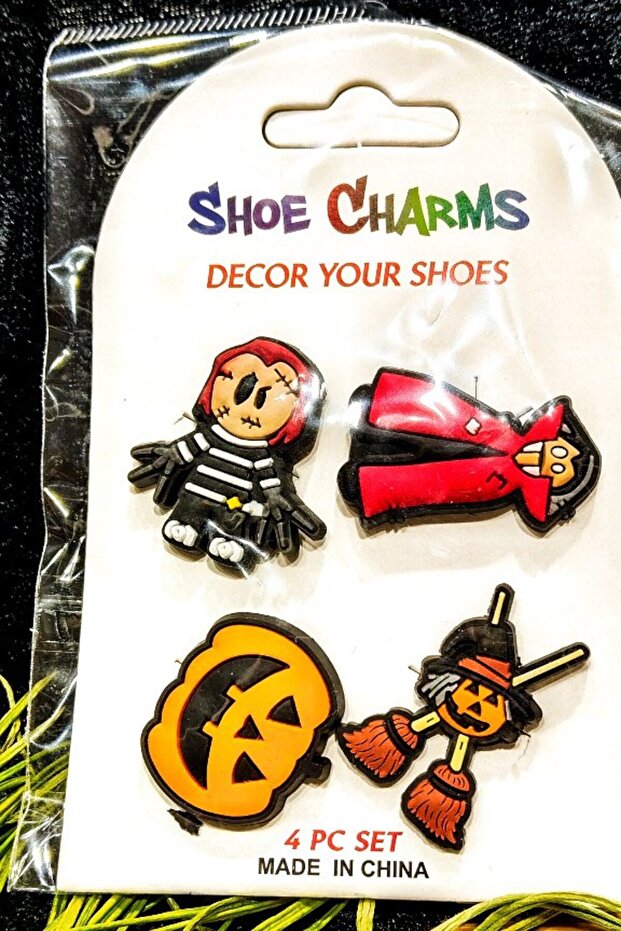 Four-Piece Cross Ornament with Colorful Figures