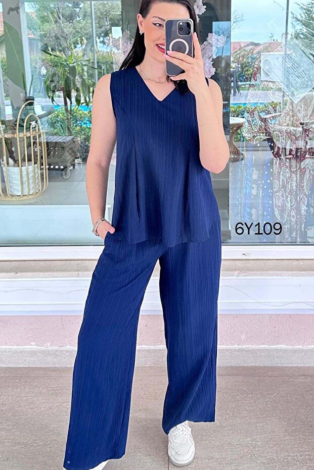 طقم مزدوج بدون أكمام وياقة على شكل V 6y109